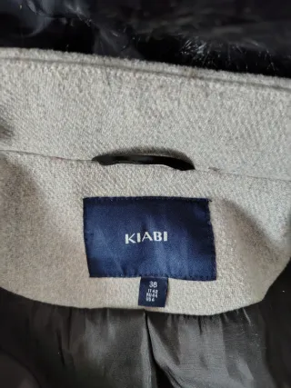 Abrigo premamá y porteo gris