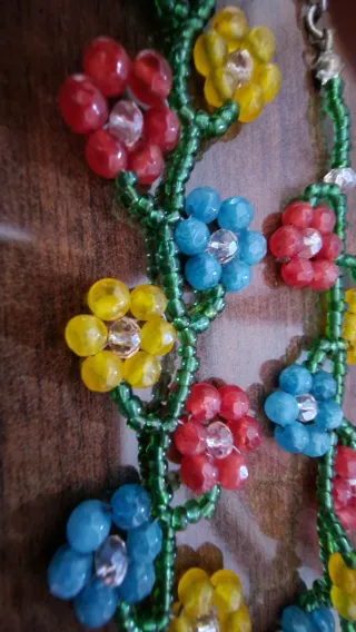 Collana fiori perline
