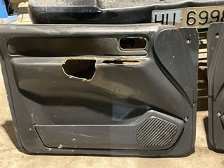 Paneles de puerta Nissan Terrano 2 año 2003