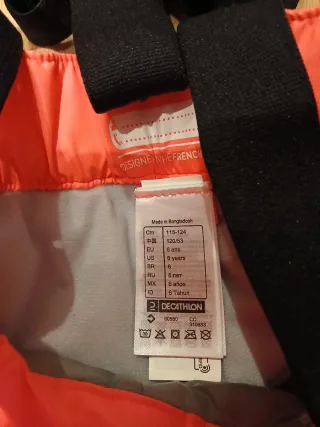 Pantaloni sci rosa con cappello