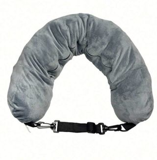 Almohada de viaje con compartimento para ropa