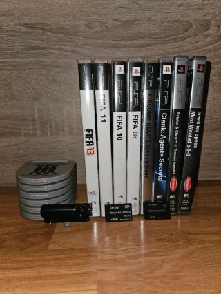 13 Giochi PSP + Fotocamera + 2 Memory Stick