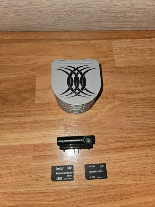 13 Giochi PSP + Fotocamera + 2 Memory Stick