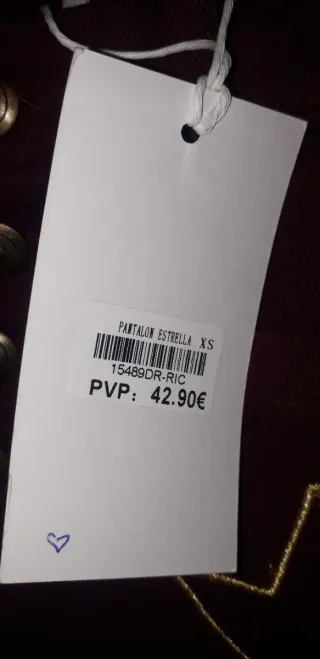 Pantalones anchos con estrellas doradas