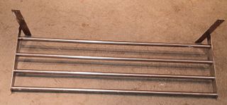 Estante de caños metálico