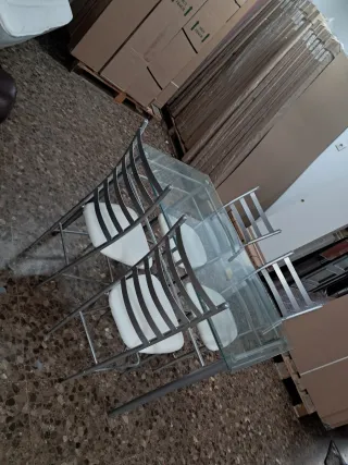 Mesa cristal y 4 sillas metal 120x76cm