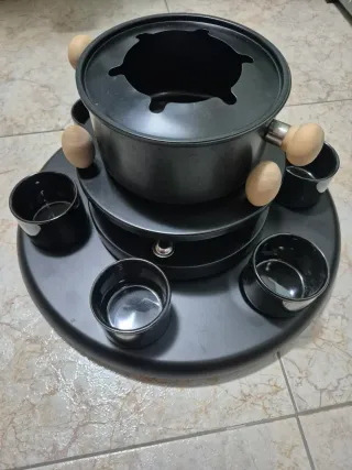 Fondue giratoria con tazas