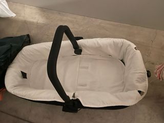 Carro de bebé y capazo naranja