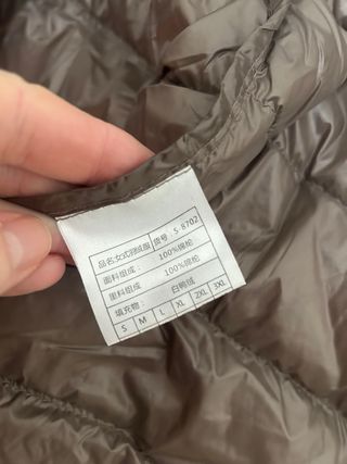 Plumas fino mujer marrón