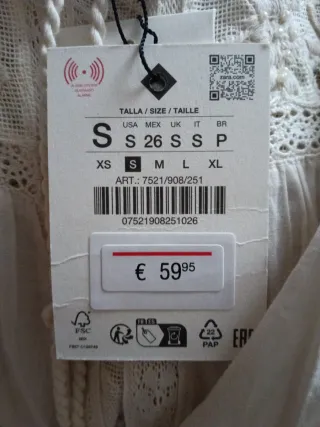 Blusa blanco roto  con detalles bordados