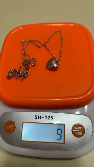 Collana vintage Guess cuore argento