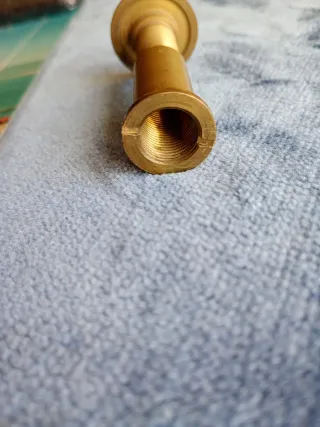 Mirilla de bronce para puerta