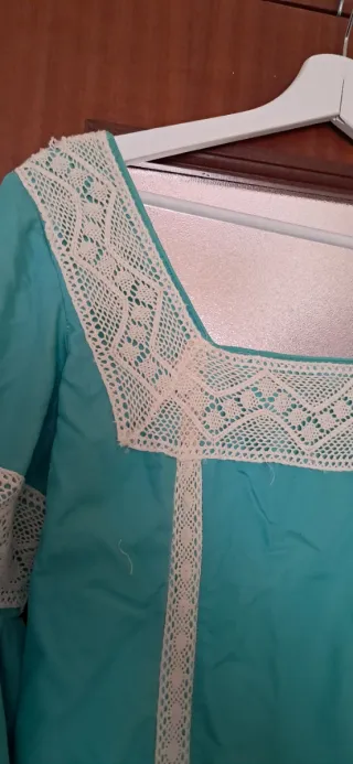 Traje de flamenca verde con volantes