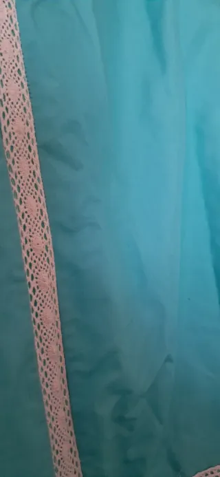 Traje de flamenca verde con volantes