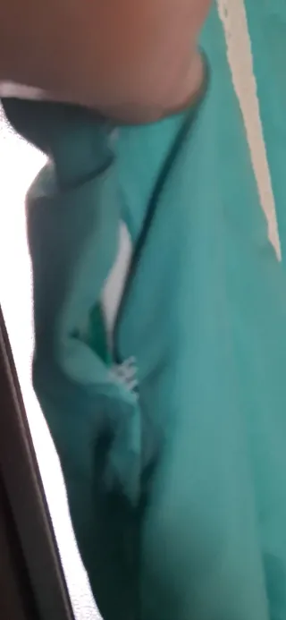 Traje de flamenca verde con volantes