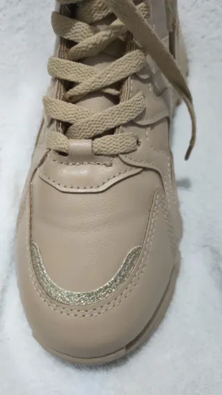 Botas Chanel bege com pelo interior