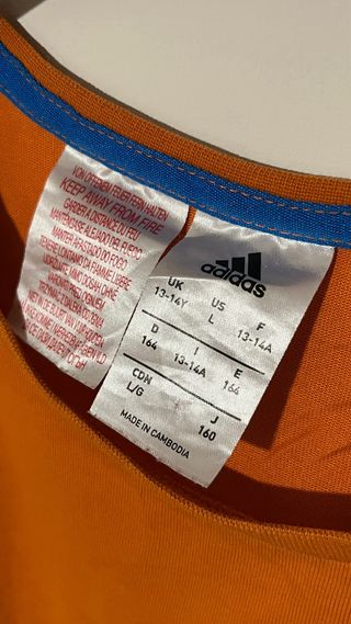 T-shirt Adidas arancione taglia 13-14 anni