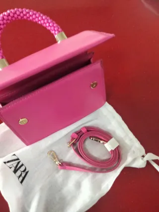Bolso fiesta Zara fucsia perlas
