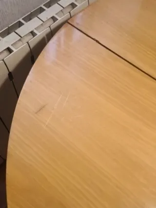 Mesa de comedor redonda de madera