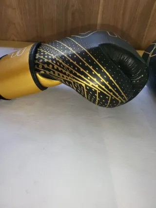 Guantes de boxeo Fila negros y dorados