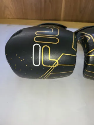 Guantes de boxeo Fila negros y dorados