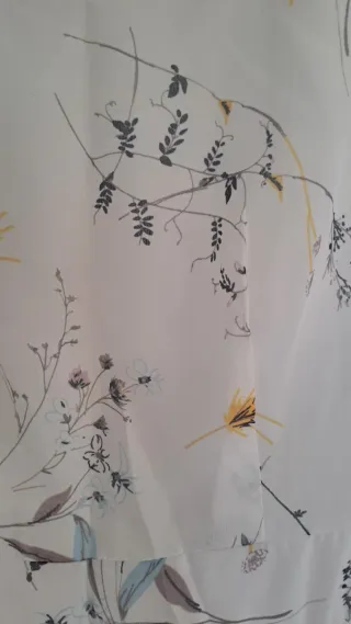 Vestido blanco gasa estampado floral. Ibicenco