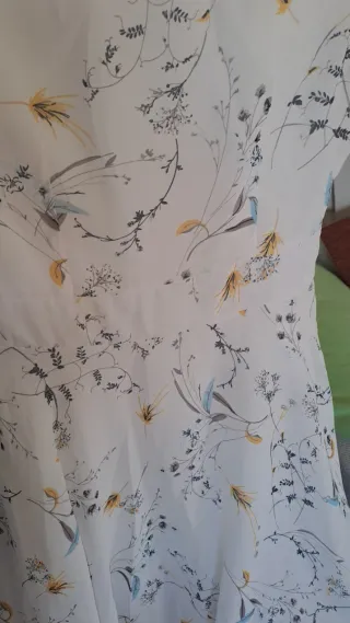 Vestido blanco gasa estampado floral. Ibicenco