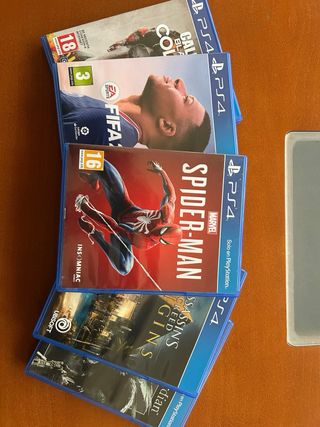 PS4 Slim Negra + 5 Juegos + Cascos