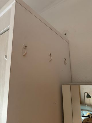 Cama abatible vertical 150x190 con estantería.