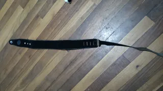 Correa de guitarra negra