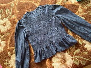 Blusa azul marino con botones