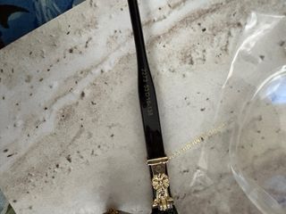 Occhiali Chrome Hearts neri con dettagli oro