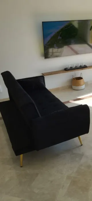 Sofá  diseño negro   tipo terciopelo