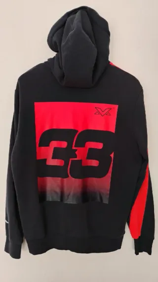 Sudadera Max Verstappen Puma azul y naranja.