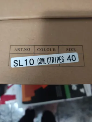 Botas plataforma estampado vaca sin estrenar