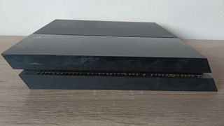 Consola PS4 Fat Negra + Mando Blanco