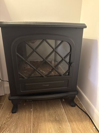 Estufa chimenea negra cristal y metal