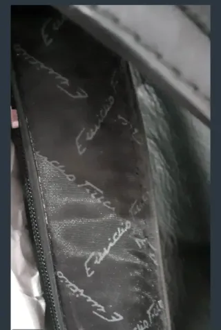 Marca: Emidio Tucci. Color: Negro.