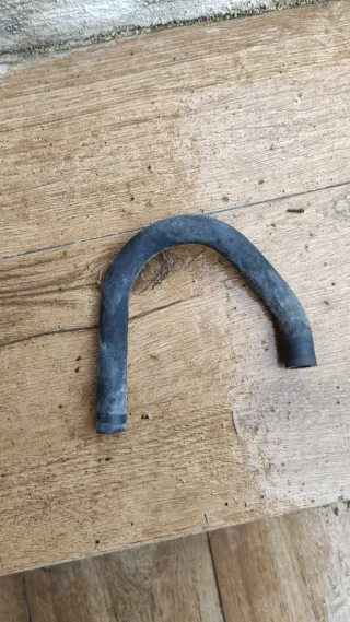 Manguito curvo de goma