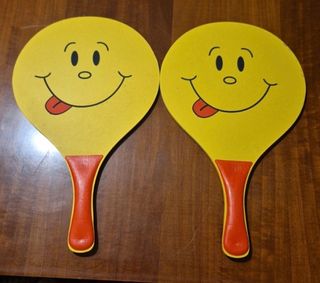 Coppie racchette faccina sorridente