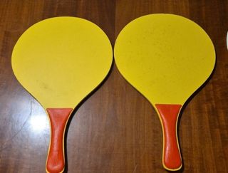 Coppie racchette faccina sorridente