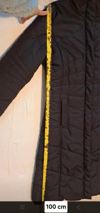 Plumífero largo negro