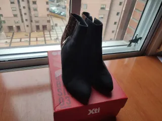 Botines ante negro y animal print