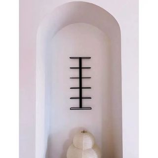 Botellero de pared metal negro