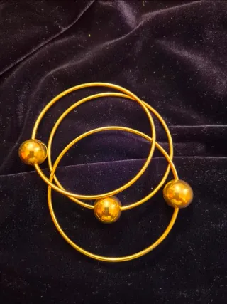 Tris bracciali metallo dorato