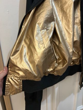 Chaqueta Bomber reversible negra y dorada