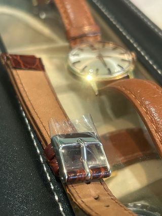 Reloj Tissot Dorado y Marrón