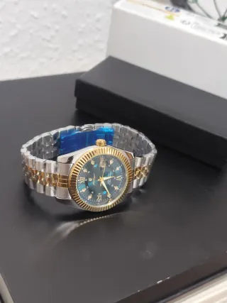 Reloj Poedagar Hombre Oro y Plata