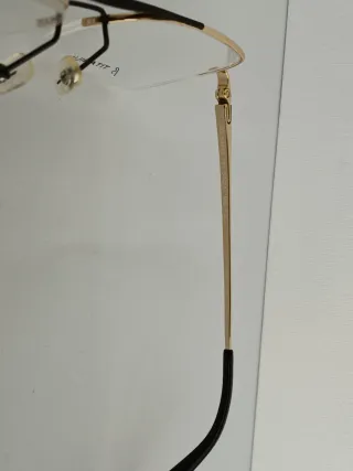 Gafas Adolfo Domínguez Titanio Doradas