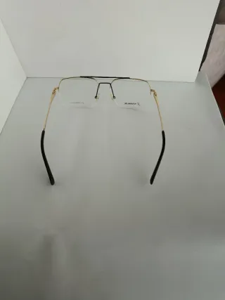 Gafas Adolfo Domínguez Titanio Doradas